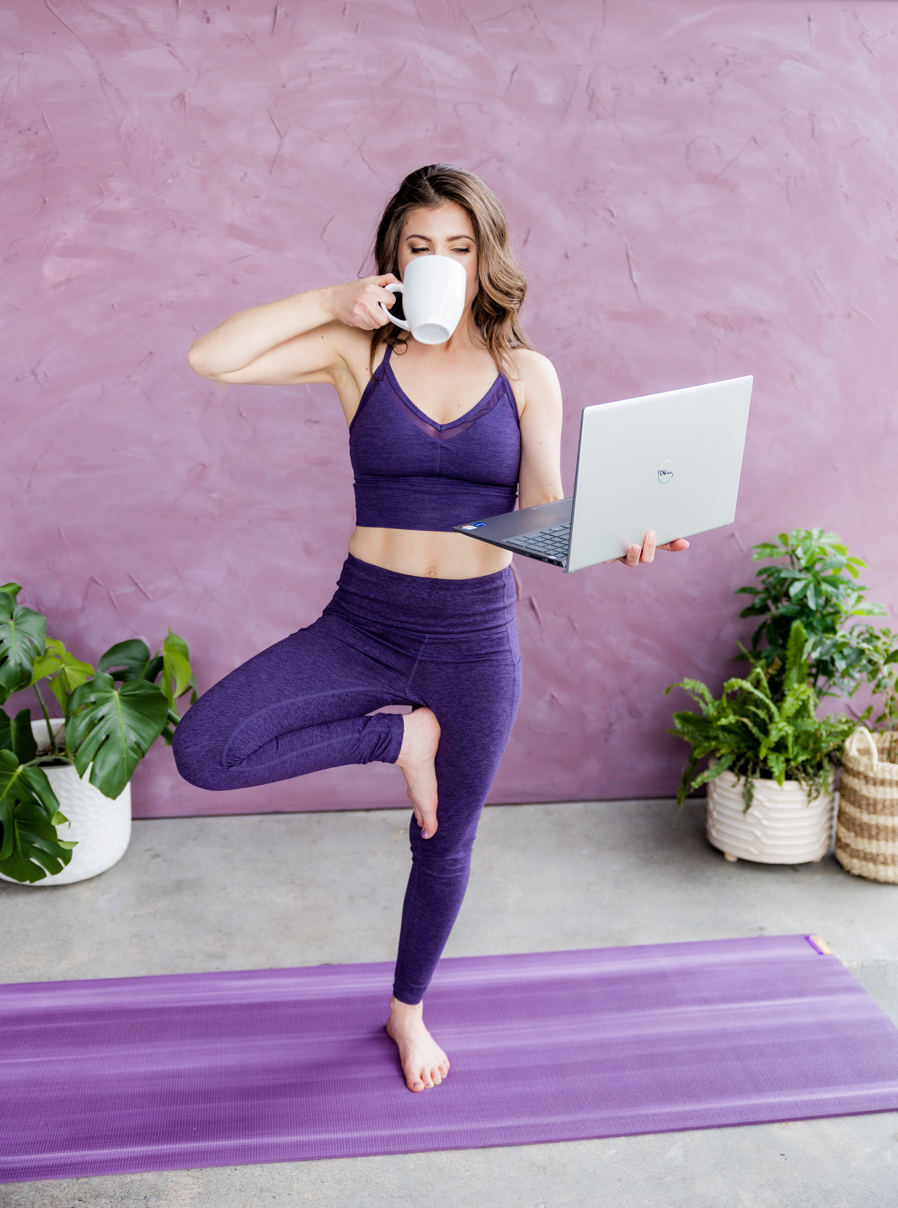 Tree pose with computer and mug